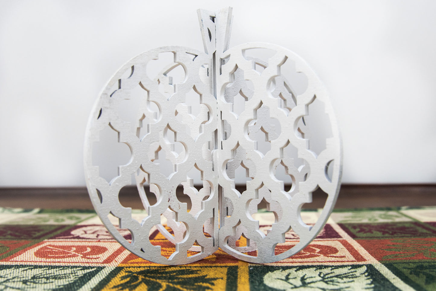 Unfinished 3D wooden pumpkin set made for DIY crafting and painting. Slot-together design for easy assembly. Great Halloween activity for kids or adults. Customize with fall colors or themes and use in tiered trays, bookshelves, or seasonal displays.