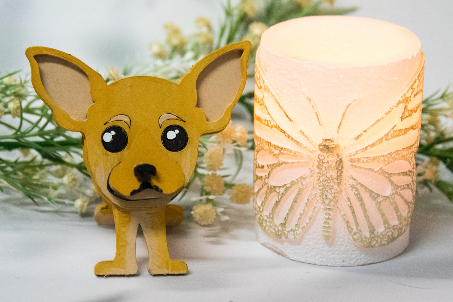 Hand-painted wooden chihuahua glasses holder shaped like a small standing dog, designed to hold eyeglasses securely on its nose. Features custom-painted colors like black, tan, or white. Functional dog decor that works as an eyeglass organizer for pet lovers, dog moms, or anyone who adores their chihuahua. Made from wood and painted by hand with charming detail, ideal for display on desks, nightstands, or bookshelves.