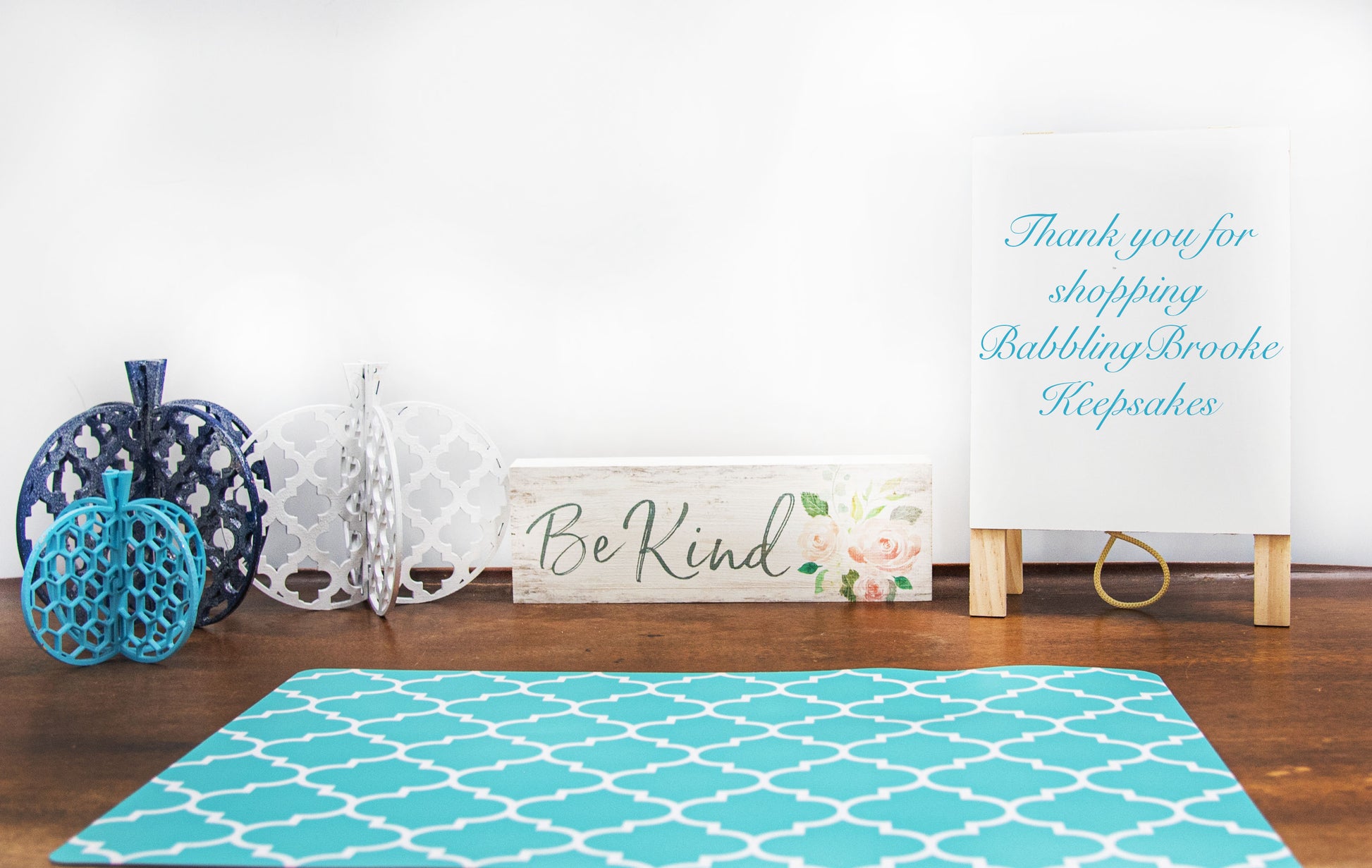 A handcrafted set of 3D wooden pumpkins designed to slot together and stand upright, perfect for Halloween or fall home decor. Each pumpkin features layered wood details and a freestanding base. Great for shelf styling, entry tables, tiered trays, or Thanksgiving centerpieces.
