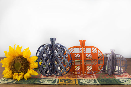 Unfinished 3D wooden pumpkin set made for DIY crafting and painting. Slot-together design for easy assembly. Great Halloween activity for kids or adults. Customize with fall colors or themes and use in tiered trays, bookshelves, or seasonal displays.
