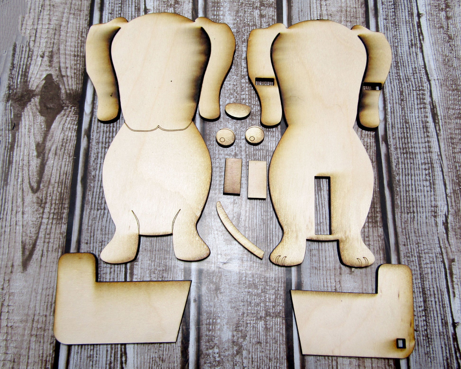 DIY large stained dachshund glasses holder craft kit with unfinished wood pieces cut and sanded, ready to paint or stain. This eyeglass stand is shaped like a dachshund dog, designed to hold glasses securely and add charm to your home. Perfect for dog lovers looking for a creative project or a handmade gift idea, complete with easy assembly instructions.