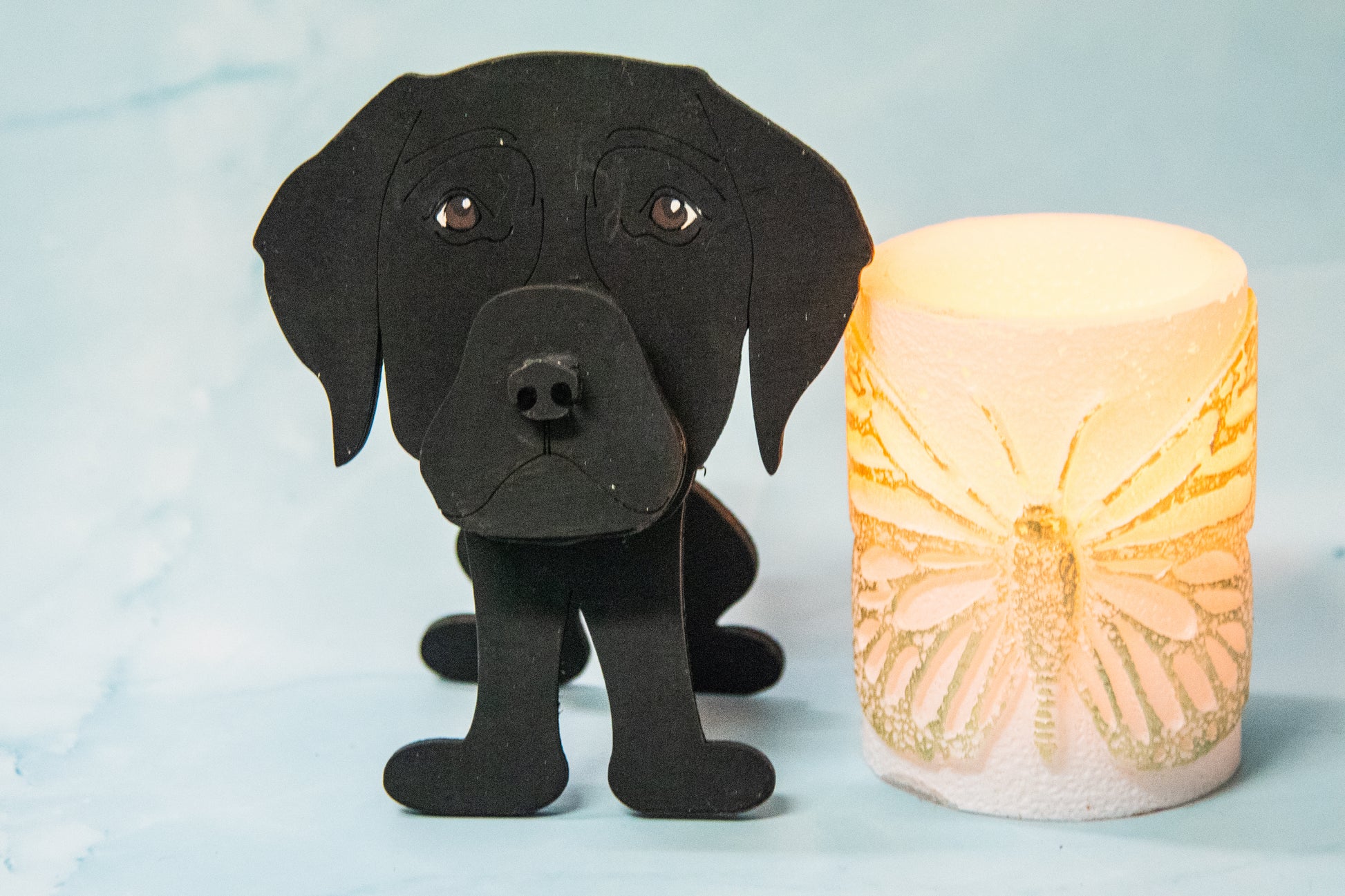 Custom handmade glasses holder shaped like a black and yellow Labrador Retriever, designed to hold eyeglasses or sunglasses. Features include a wooden build, optional DIY kit for paint-your-own fun, and an engraved nameplate for personalization. Shown assembled and with DIY parts, this functional and decorative dog-shaped