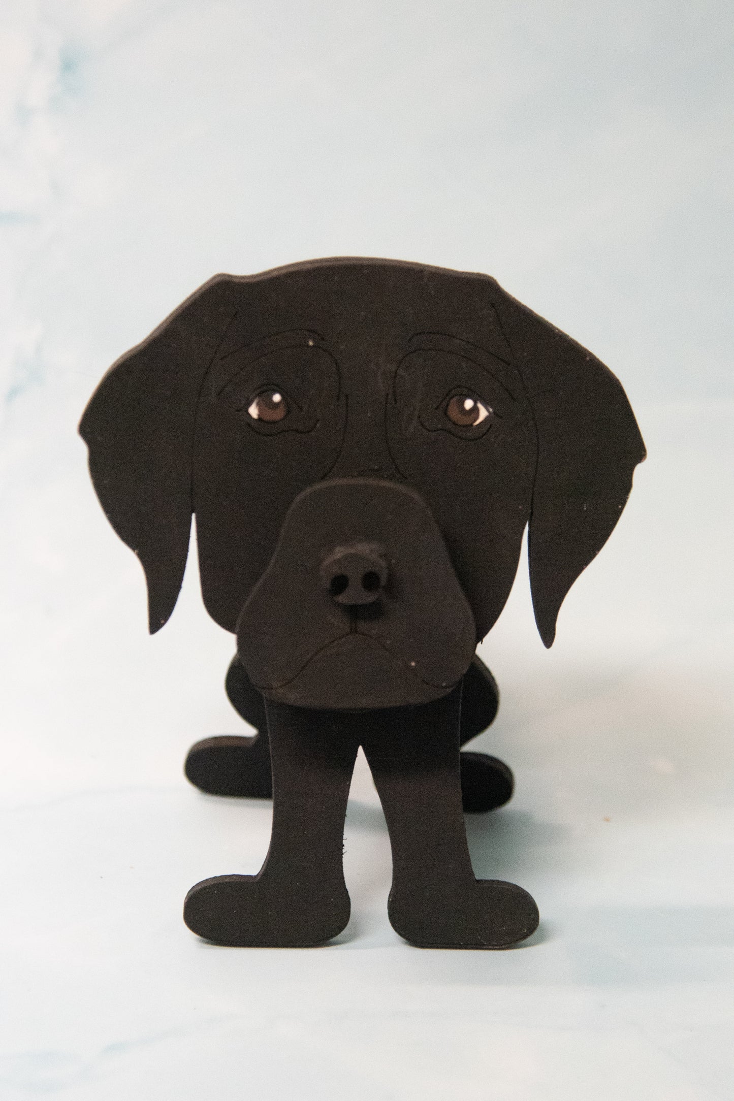 Custom handmade glasses holder shaped like a black and yellow Labrador Retriever, designed to hold eyeglasses or sunglasses. Features include a wooden build, optional DIY kit for paint-your-own fun, and an engraved nameplate for personalization. Shown assembled and with DIY parts, this functional and decorative dog-shaped
