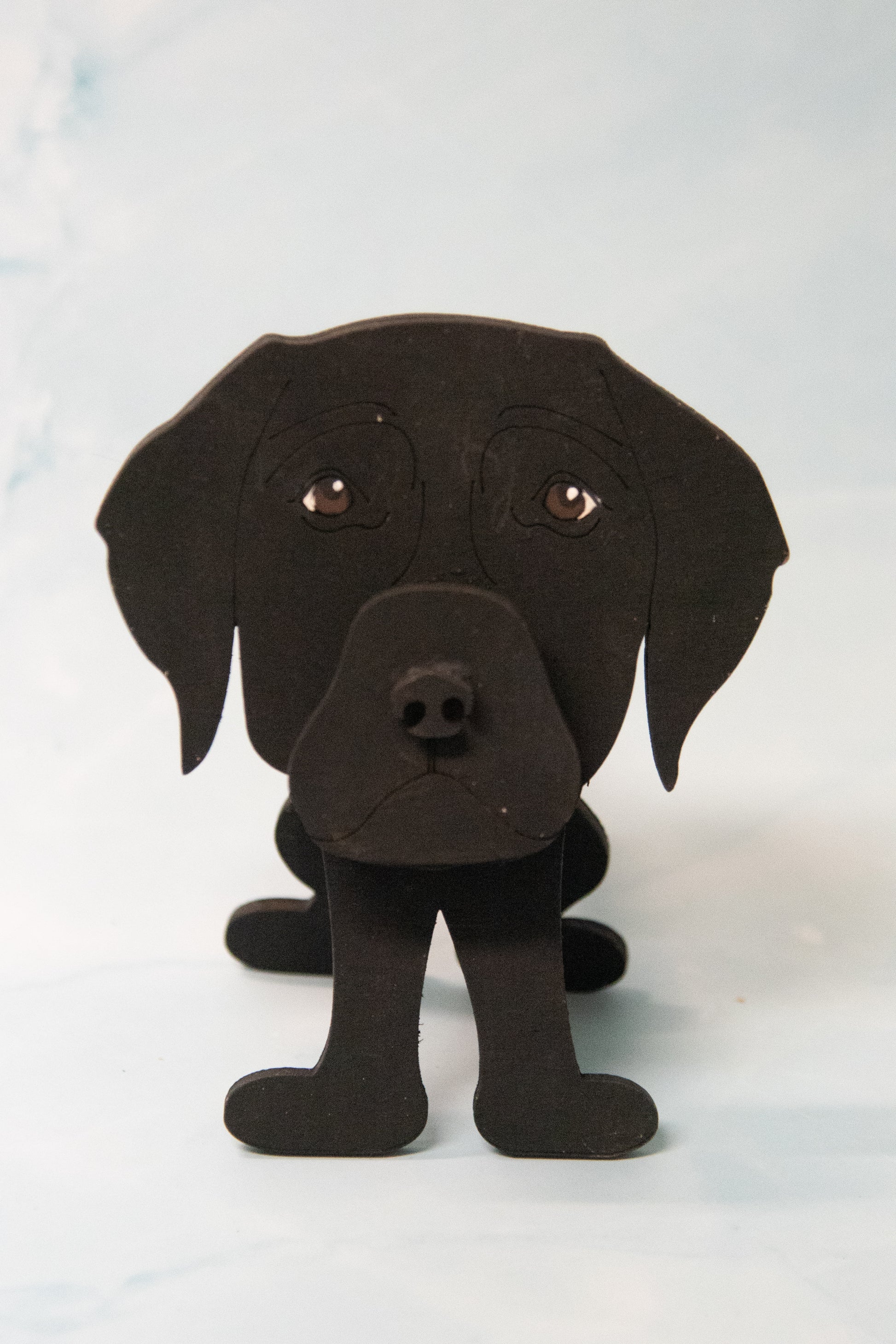 Custom handmade glasses holder shaped like a black and yellow Labrador Retriever, designed to hold eyeglasses or sunglasses. Features include a wooden build, optional DIY kit for paint-your-own fun, and an engraved nameplate for personalization. Shown assembled and with DIY parts, this functional and decorative dog-shaped