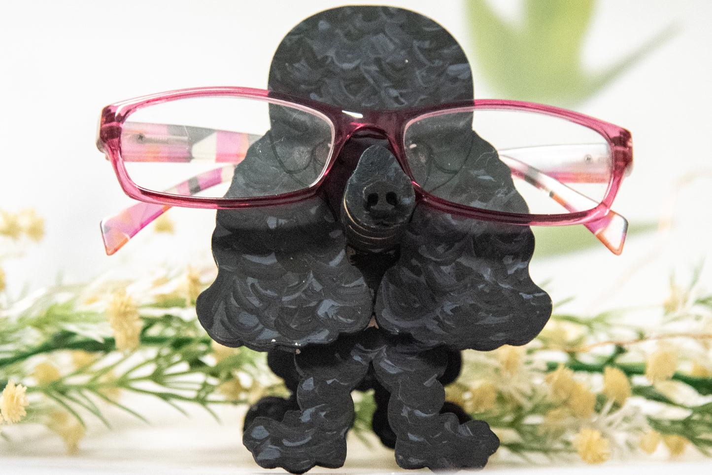 Handcrafted wooden poodle glasses holder stand in standard or miniature poodle shape, with optional bow detail, shown in black and white but fully customizable, unique dog lover gift
