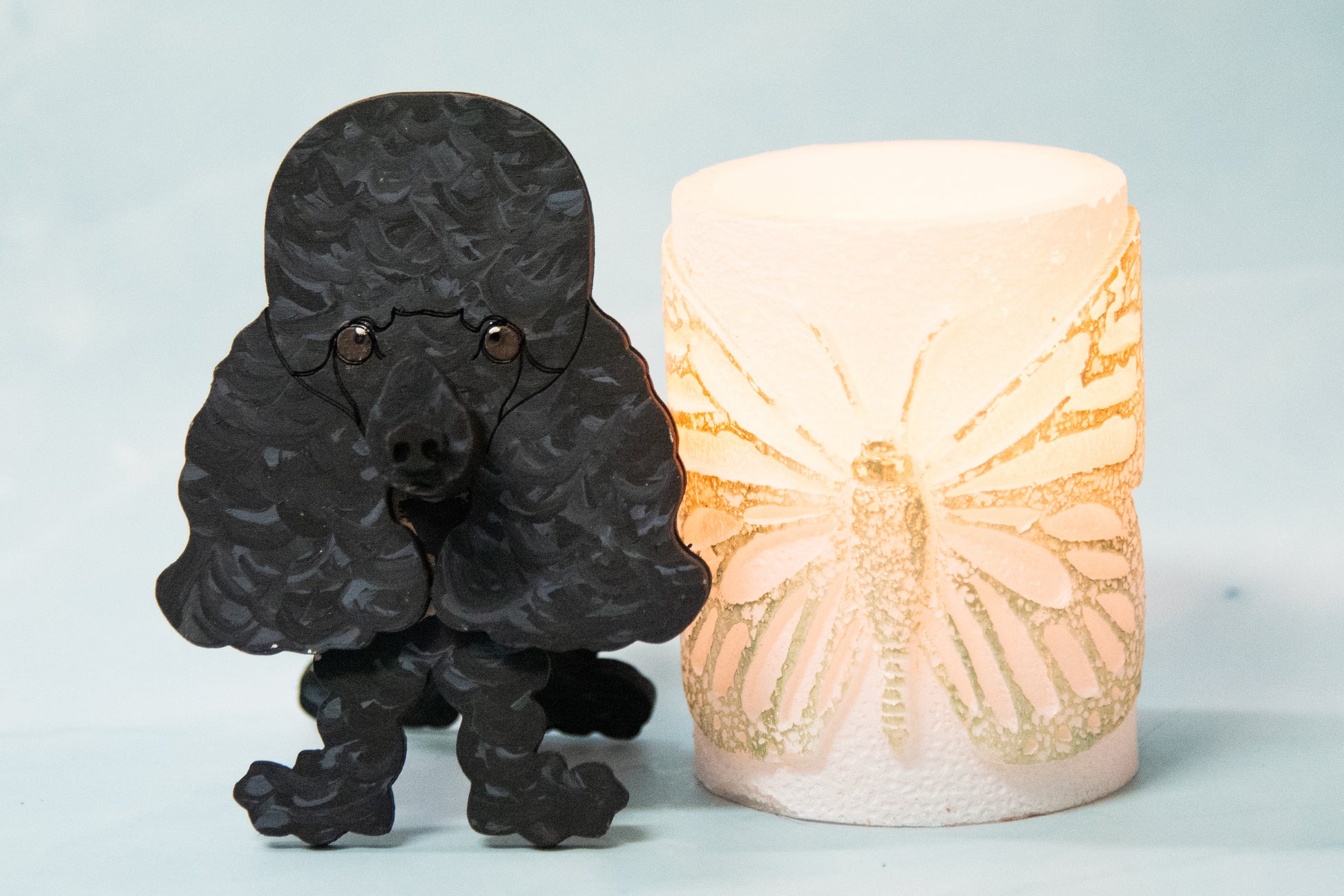 Handcrafted wooden poodle glasses holder stand in standard or miniature poodle shape, with optional bow detail, shown in black and white but fully customizable, unique dog lover gift
