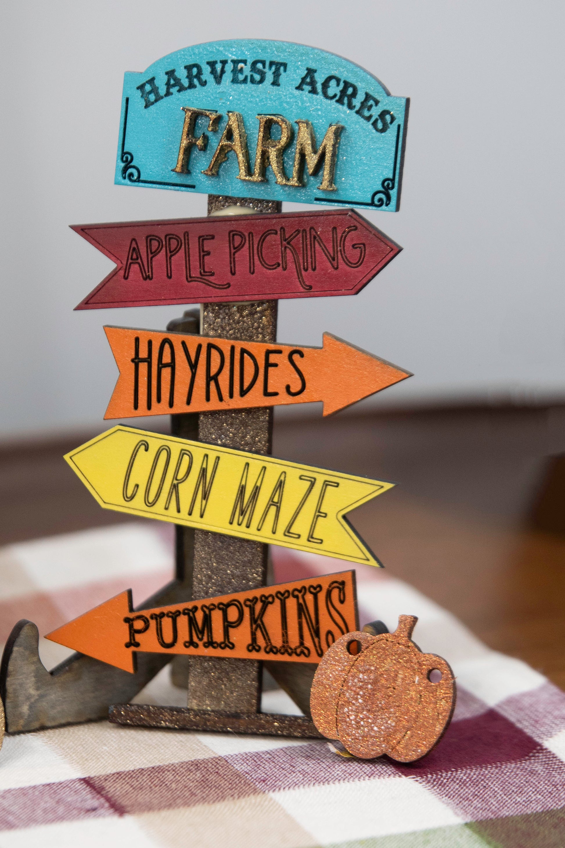 Pumpkin Patch Tiered Tray Set featuring 6 wooden fall decor pieces including pumpkin signs, hayride accents, and rustic autumn colors. Perfect for farmhouse style tiered trays, cozy fall shelf sitters, table decor, or entryway setups. Customizable colors available. Handmade rustic fall home decor that makes a beautiful seasonal accent or unique gift for autumn lovers. Finished version shown ready to display.