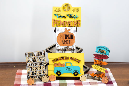 Pumpkin Patch Tiered Tray Set featuring 6 wooden fall decor pieces including pumpkin signs, hayride accents, and rustic autumn colors. Perfect for farmhouse style tiered trays, cozy fall shelf sitters, table decor, or entryway setups. Customizable colors available. Handmade rustic fall home decor that makes a beautiful seasonal accent or unique gift for autumn lovers. Finished version shown ready to display.