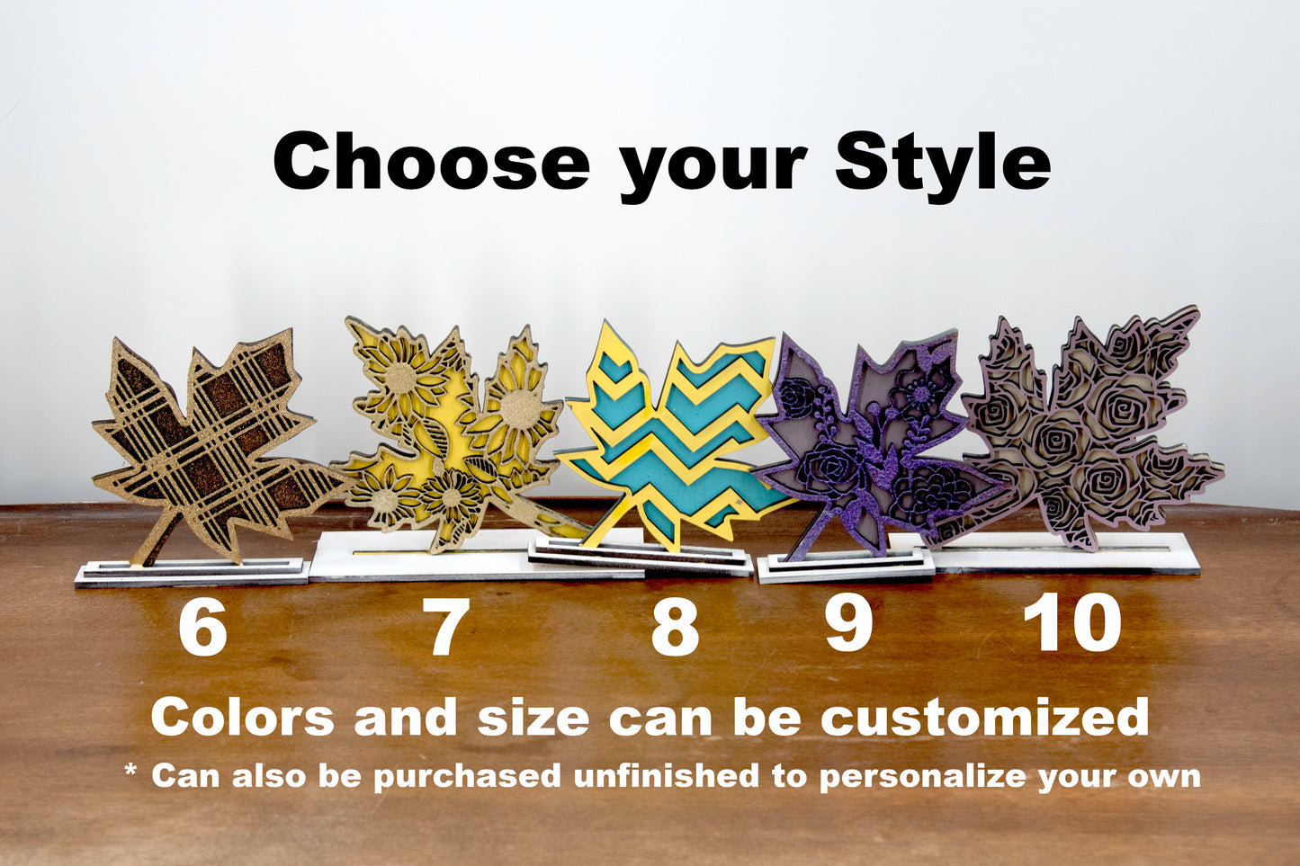 Set of freestanding wooden leaf shelf sitters with two-layer designs, featuring colorful stained bases and patterned top cutouts in fall-themed shapes. These decorative leaves range in size from 3" to 6" tall and are ideal for mantels, tiered trays, and autumn home displays. Handcrafted, rustic, and available in custom colors. Perfect for fall decorating, Thanksgiving accents, and cozy seasonal vibes.
