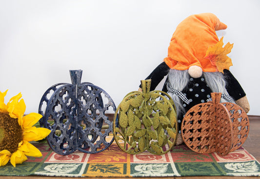 Set of handcrafted 3D wooden pumpkins in fall colors with interlocking design, standing upright for tiered trays or shelf decor, available in custom or traditional autumn tones.
